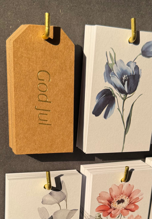 God Jul tag guld text på kraftpapper