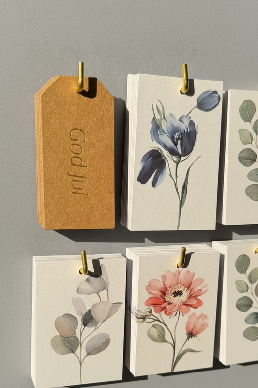 God Jul tag guld text på kraftpapper